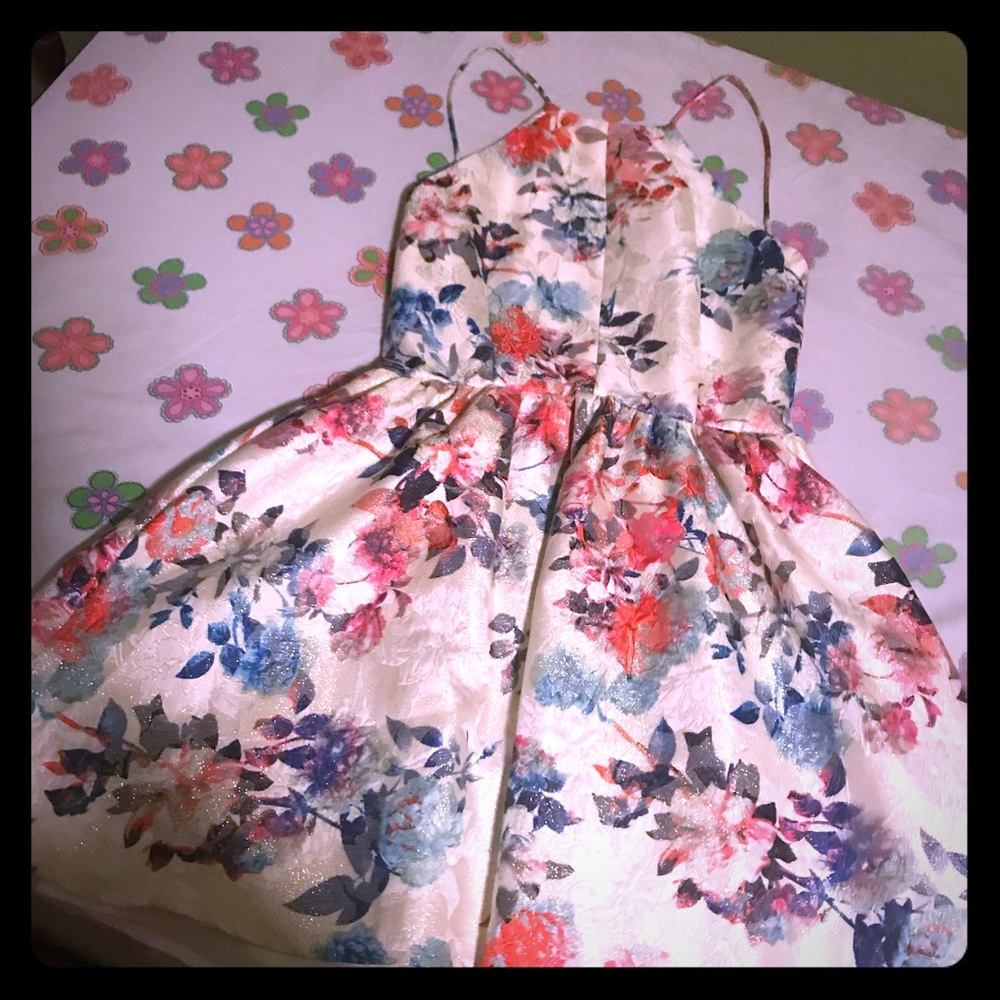 a beautiful white sparkly flowery dress